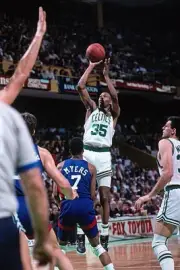 Reggie Lewis Boston Celtics shoots v New Jersey Nets played circa - Old Photo
