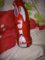 Two limited edition Easter special old coke bottleles.
