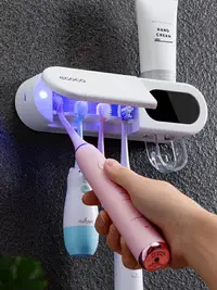 在飛比找樂天市場購物網優惠-智能消毒擠牙膏神器家用紫外線殺菌牙刷置物架壁掛式自動擠牙膏器