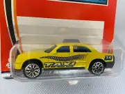 2003 MATCHBOX SUPERFAST- #36 TAXI CAB- YELLOW - NO LOGO- HERO CITY SERIES MIP