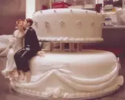 Sitting Bride and Groom Wedding Cake Topper.Ceramic.