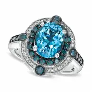 Oval Blue Topaz and 0.75 CT. T.W. Enhanced Blue and White Natural Diamond Ring in Sterling Silver