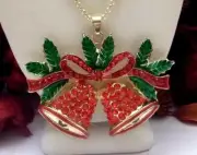 BETSEY JOHNSON SPARKLING RED CRYSTAL AND ENAMEL BOWTIE BELLS PENDANT NECKLACE