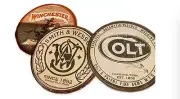 3 Tin Signs 1 Winchester 1 Smith & Wesson And 1 Colt 45