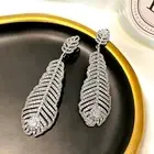 Made with SWAROVSKI crystal peacock feather 18k white gold filled party earrings