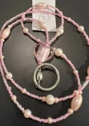 NEW EYEGLASSES HOLDER. MATTE SILVER METAL FINISH HOLDER WITH PINK BEADS & STONE