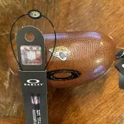 Oakley NFL Jacksonville Jaguars Bundle…Leash/Strap And Football Hard Case