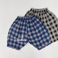 在飛比找ETMall東森購物網優惠-復古森系韓國格子棉麻透氣五分褲