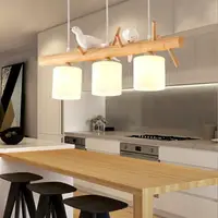 在飛比找樂天市場購物網優惠-北歐餐廳吊燈創意個性小鳥燈日式飯廳三頭餐桌臥室實木吧臺燈具 