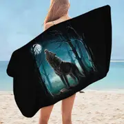 A Wolf Howls at a Moon Microfiber Beach Towel