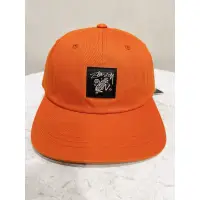 在飛比找蝦皮購物優惠-stussy  全新 橘色 板帽