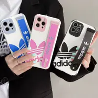 在飛比找蝦皮購物優惠-adidas 手機殼 適用iPhone14手機殼 腕帶支架 