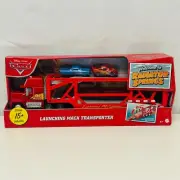 Disney Pixar Cars - LAUNCHING MACK TRANSPORTER GHOSTLIGHT RAMONE - 1:55 Diecast