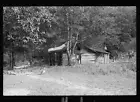 Cabins,buildings,structures,homes,porch,laundry,clothing line,children,1935 2