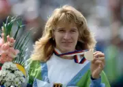 Steffi Graf of Germany poses with the gold medal after defeating - Old Photo