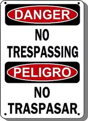 Danger Sign - No Trespassingr - 10"x14" Bilingual OSHA Sign