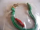Coca Cola bracelet green guitar bottle unused rare