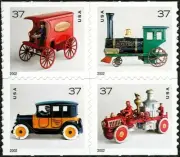 4 ANTIQUE TOYS STAMPS Cast-Iron Mail Truck, Locomotive Engine, Taxi, Fire Pumper