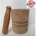 New Wood Mortar and Pestle Crushing Ginger Spices Garlic Herbs in the Kitchen