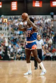 Truck Robinson of the Phoenix Suns shoots 1980's Basketball Photo 3