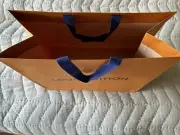 Empty Louis Vuitton box with shopping bag