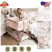Adjustable Baby Bedside Sleeper with Wheels - Modern Bassinet for Girls in Pink