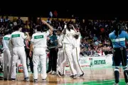 Robert Parish is introduced in the starting lineup prior to a game- Old Photo