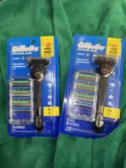2 GILLETTE PROGLIDE RAZOR 2 HANDLES PLUS 8 CARTRIDGES TOTAL