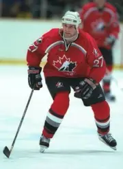 Shayne Corson of Canada in action against Sweden at the Big Hat Ar- Old Photo