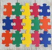 Puzzle piece cut outs Primary colored School supply bulletin board supplies