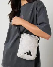 [adidas] adidas Women's Linear Organizer Mono Messenger Bag in Wonder Alumina/Orbit Grey/Black One Size Wonder Alumina/Orbit Grey/Black
