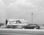 8x10 of traffic and a Mobilegas Billboard on the Blvd in Chicago, IL, circa 1941