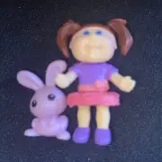 Adorable, Tiny Cabbage Patch Kids 1 1/2 Inch Doll Collectible Fig purple bunny.