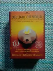 One Light, One World A Replica of the Oil Lamp Copyright 1998