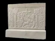 The Darius seal in a royal chariot below Ahura Mazda , assyrian art Sculpture