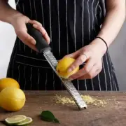 12-inch stainless steel grater, zester, peeler, multifunctional kitchen tool.