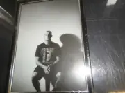 MICK FANNING--THE SHARK WHISPERER- BLACK & WHITE FRAMED PROFILE PIC. SITTING ON