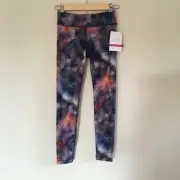 NWT Athleta girl printed chit chat tight leggings L/12 Frozen Floral Outer Space