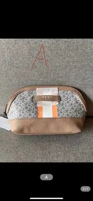在飛比找Yahoo!奇摩拍賣優惠-DKNY   手拿包 盥洗包 收納袋  化妝包
