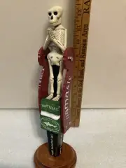 DOGFISH HEAD NAMASTE TILTING SKELETON draft beer tap handle. DELAWARE