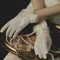 在飛比找Yahoo!奇摩拍賣優惠-蘇珊家 新款新娘舞會手套 婚禮結婚白紗短版手套 緞面婚紗禮服