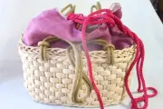 Wicker (new) WICKER BAG - USE AS A BASKET OR BAG - 4.5"T X 8"L X 4" W