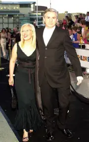 Catherine Martin and Baz Luhrmann arrive for the premiere of the - Old Photo 1