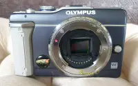 在飛比找Yahoo!奇摩拍賣優惠-olympus E PL1 微單眼相機 {單主機}