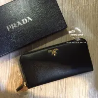 在飛比找蝦皮購物優惠-PRADA 萬年經典水波紋長夾-黑色 新款直紋路 現貨+預購