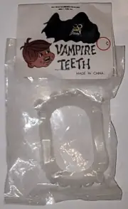 VINTAGE "VAMPIRE TEETH" HALLOWEEN FANGS-ORIGINAL-NOS-DRACULA TEETH-