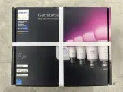 Philips Hue Starter Kit 4 Pack E26 White and Color Ambient Bulbs with Bridge