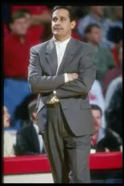 Rebels head coach Bill Bayno looks on the Fresno State Bulldogs at- Old Photo