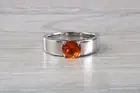 Round cut Fire Opal set on a Chunky 18ct White Gold Ring