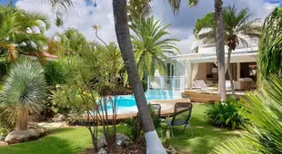 Villa Piscine et Iguanes en bord de mer proche plages marina et golf